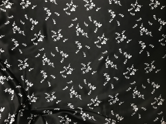 White Small Flowers on Black  Background - Stretch Mulberry Silk Satin - 19 MM - 140 cm Wide.
