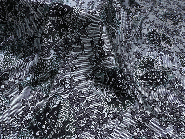 Black with Shades of Green Print on Natural White - Stretch Silk Satin - 140 cm Wide