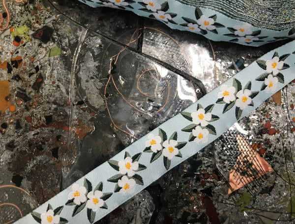 White/Green Flowers  on Pale  Blue Background  - Embroidered Jacquard Ribbon - 7/8" Wide.