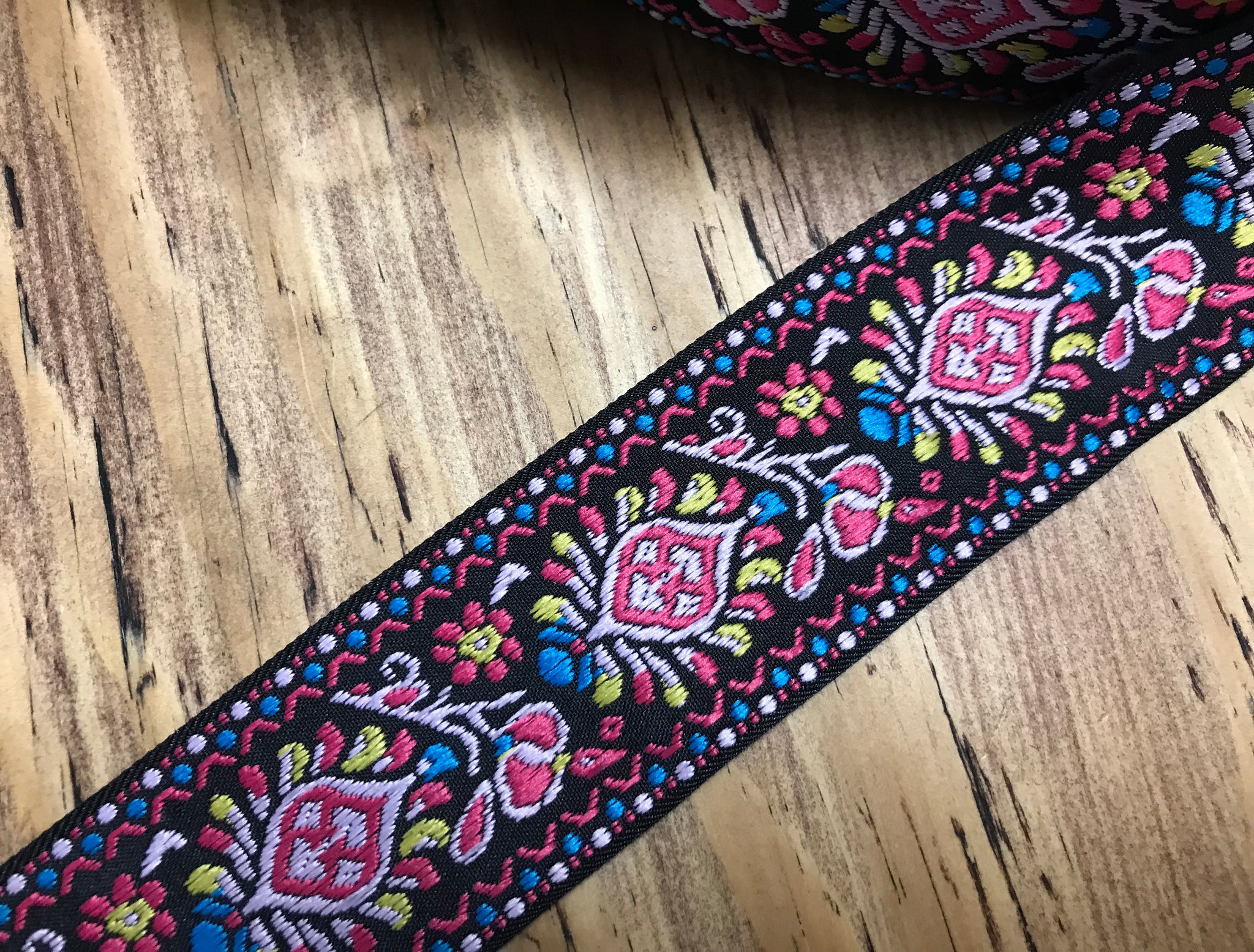 Multi Color w/Pink on Black Background - Embroidered Jacquard Ribbon - 5 cm Wide.