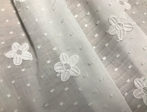 White All Over Embroidery - Broderie Anglaise on SwissWhite All Over Embroidery and Swiss Dot - Broderie Anglaise on Swiss Cotton Voile - 138 cm Wide. Cotton Voile - 138 cm Wide.