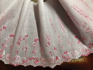 Hombre Pink Embroidery on Light Pink Background _ Swiss Cotton Voile Lace_ 20 cm Wide.
