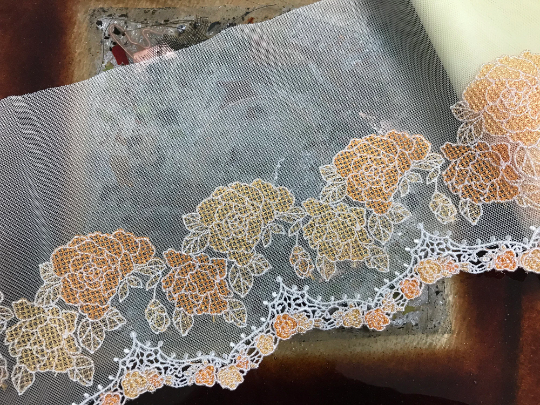 Shades of Orange and White on Yellow  Background- Embroidered Lace, 18 cm Wide.